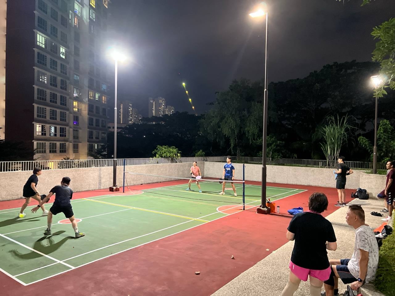 A Batok Social Picklers doubles game under the lights